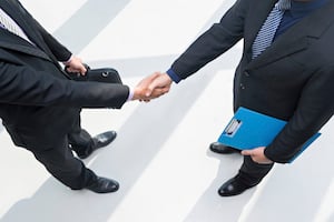 professionals-meet-shake-hands