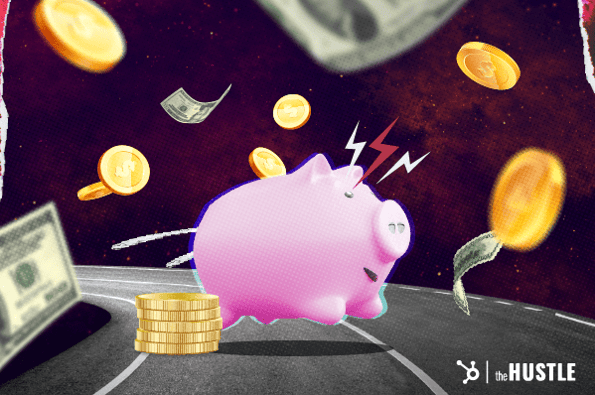 What is fintech? A piggy bank runs with money around it.