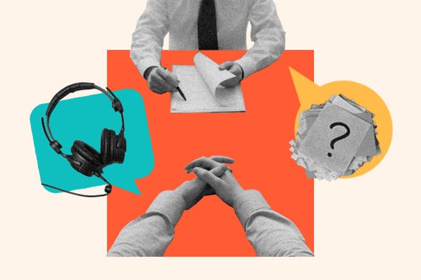 customer service interview questions: image shows two people sitting across from a table on an interview