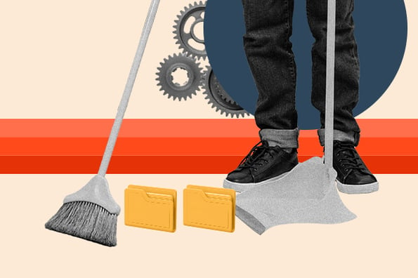 clean crm data: image shows a person with a broom 