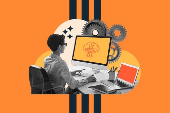 ipaas guide: image shows a person on their computer with gears in the background 