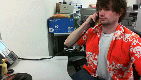 Call center GIF of a frustrated man.