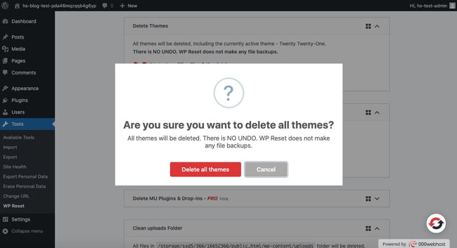 Click delete all themes button to confirm resetting WordPress