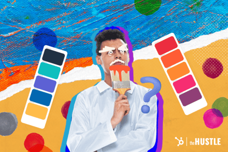 Color psychology: a man holding a paintbrush looks off in wonder while surrounded by different palettes.