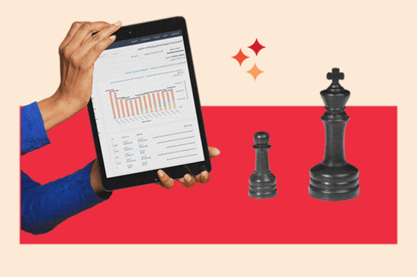 strategic plan abstract visual of hands holding a tablet with a plan on it and chess pieces to the right.