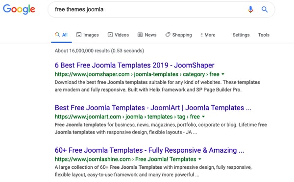 Google SERP for longtail keyword "free themes joomla"