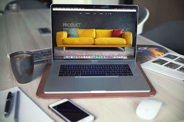 Startup website for furniture store displayed on laptop
