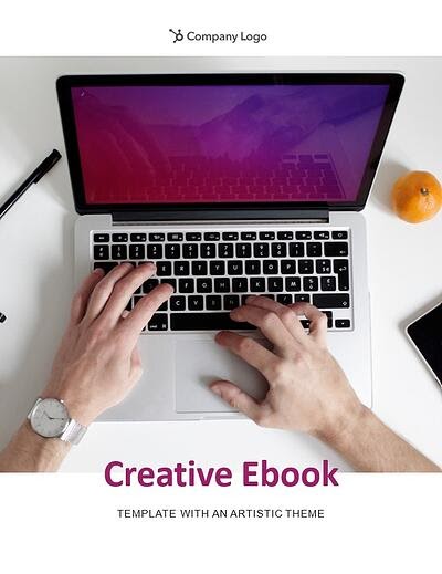 example page from the artistic theme that reads "creative ebook template with an artistic theme" in purple along with a dynamic photo of a laptop with purple screen