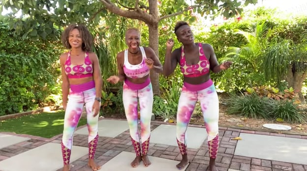 three Youtubers filming dance videos outdoors