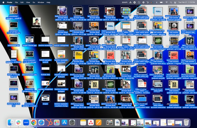 cluttered desktop with 100 files and many images overlapping