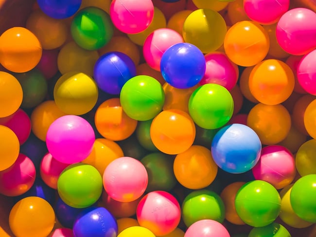 an assortment of colorful bouncy balls