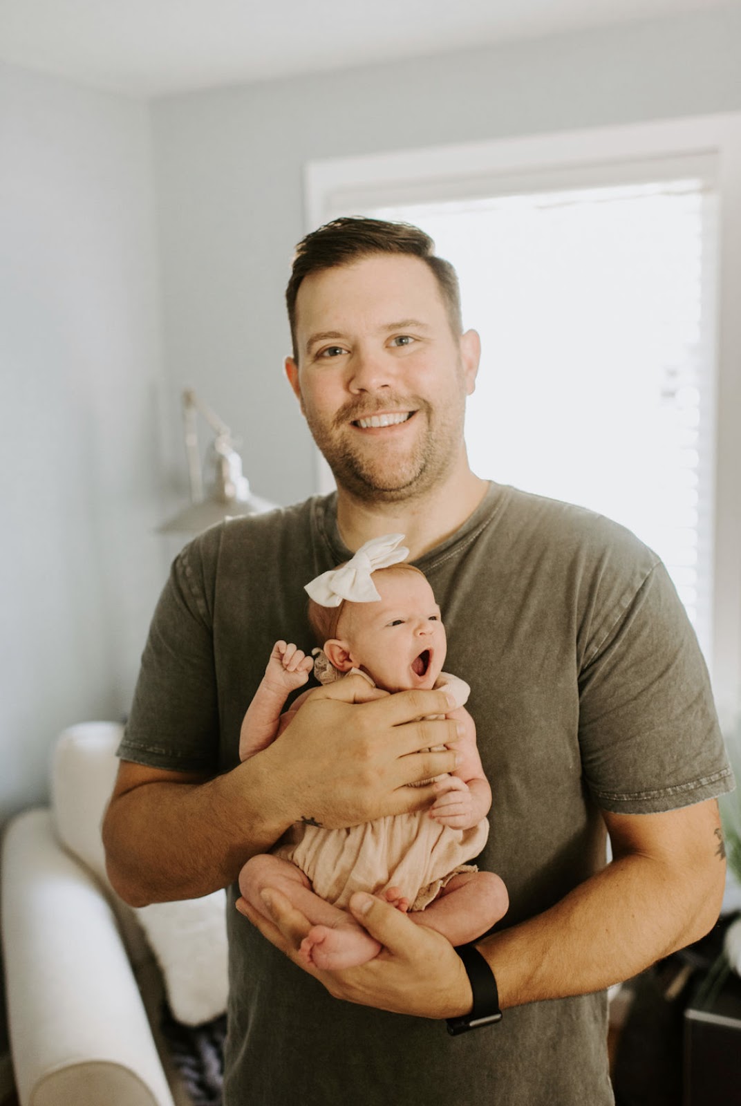 Greg Brumann with his baby daughter. 