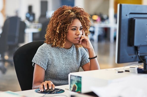 Woman learning about the different Java IDE options and how to identify which is best for her projects.