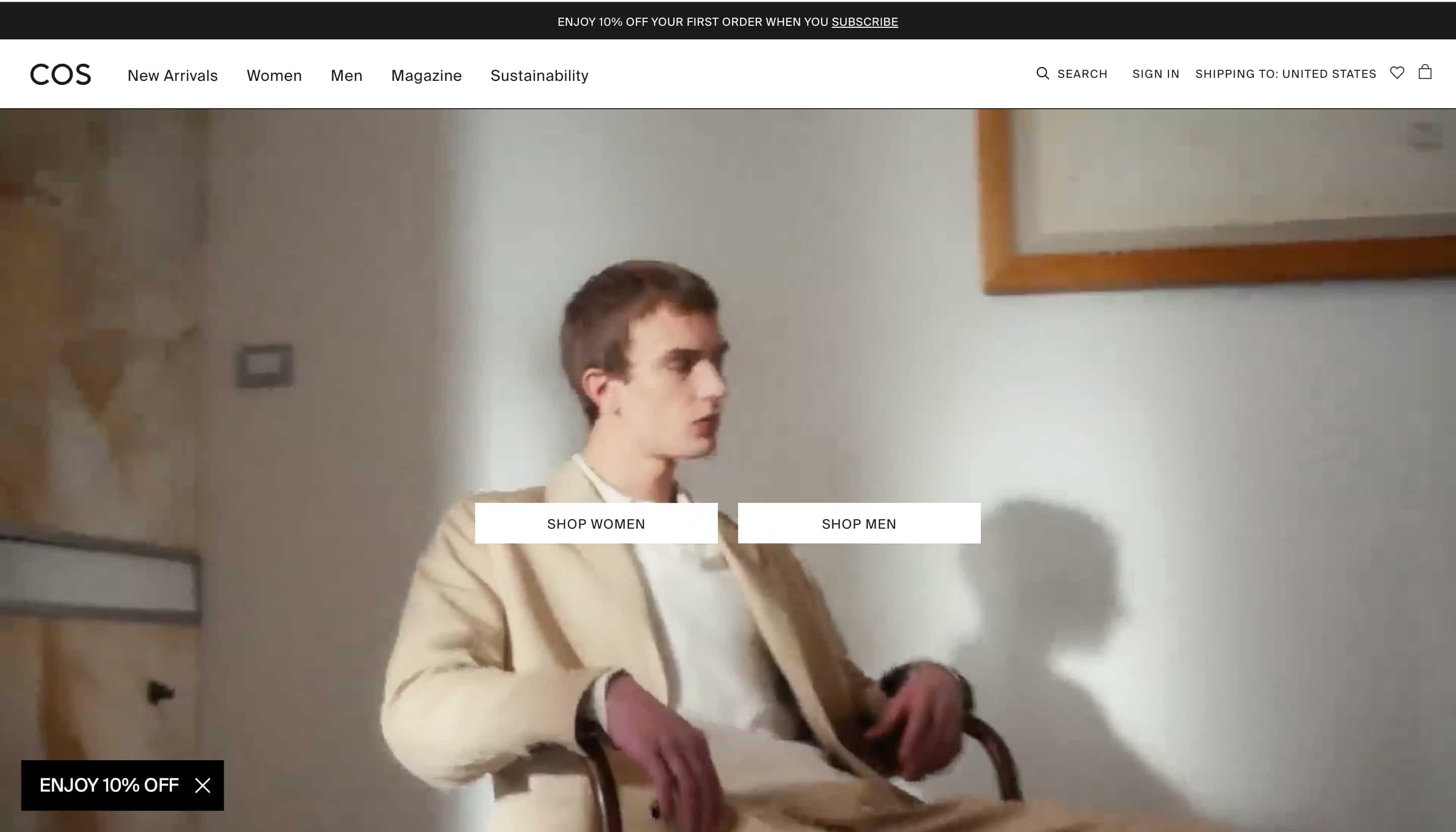 fashion website design cos shows person sitting in chair wearing cos clothes 