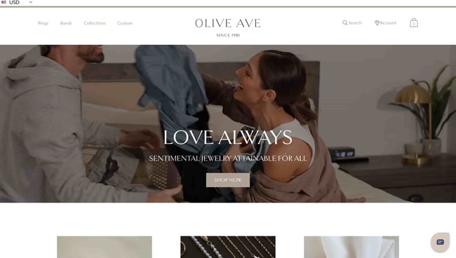 fashion website design examples olive ave shows couple playfully embracing 