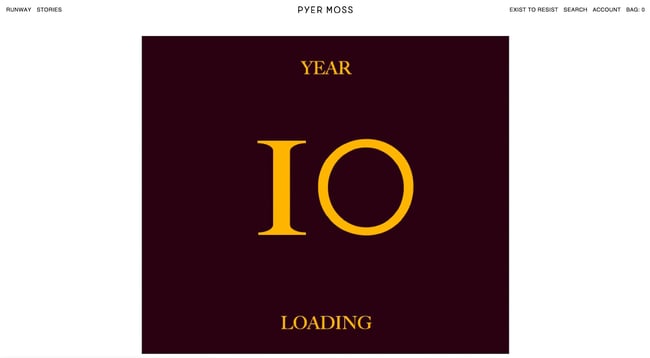 fashion website design Pyer Moss shows box with 'year 10 loading' in the middle in yellow font. 