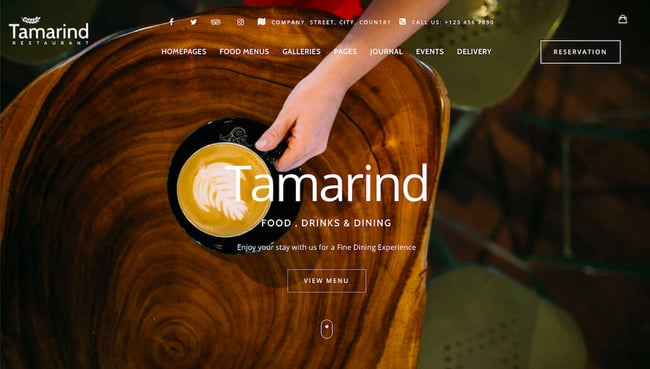 restaurant wordpress themes: Tamarind demo features background image and CTA to view menu
