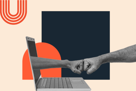 two fists bumping each other, one coming out of a laptop screen to represent ai in customer service