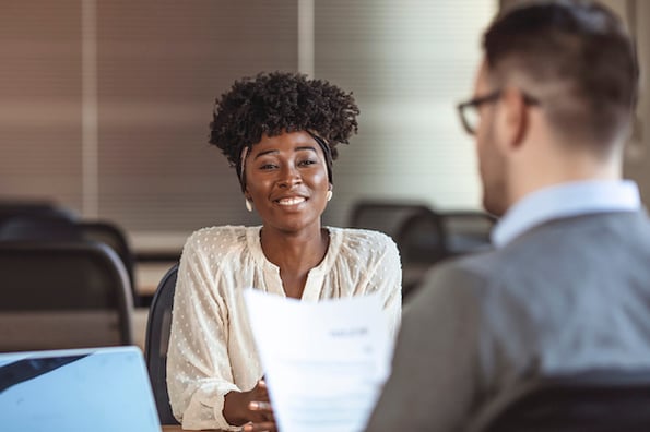 Candidate answering the best interview questions to nail a job interview. 