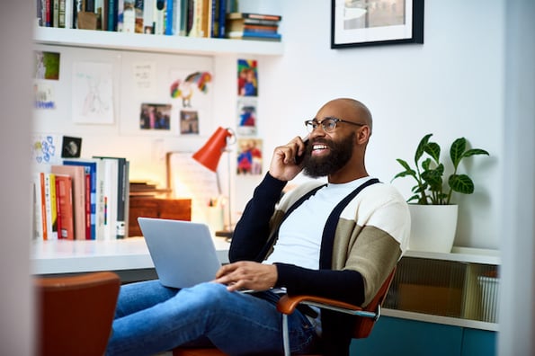 Salesperson in a phone meeting after using a group scheduling tool