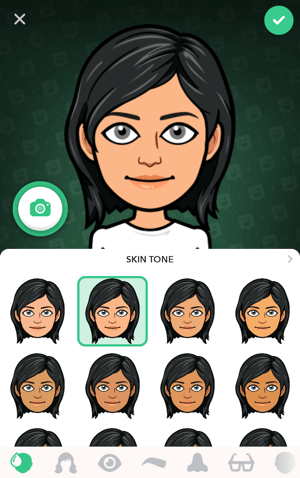 Màn hình ứng dụng Bitmoji với hình đại diện phụ nữ tóc đen và tùy chọn tông màu da