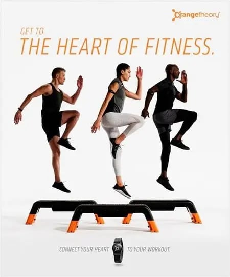 Brand perception examples from orange theory fitness showing angular text suggesting motion and an active workout session. Image name: brand-perception-orange-theory