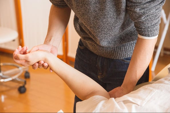 person recieving chiropractic treatment