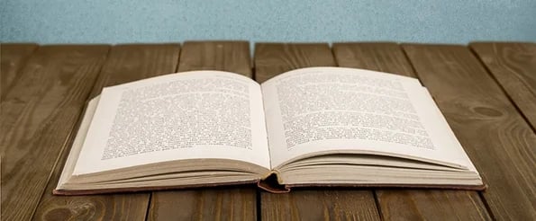 how to tell a great nonprofit story: image shows open book