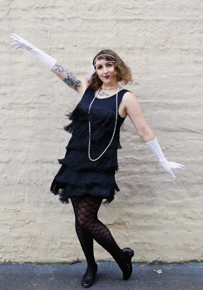 Woman dressed as flapper for office Halloween party