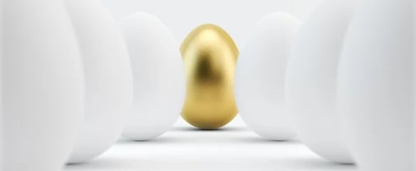 the golden age of advertising: image shows golden egg among white eggs