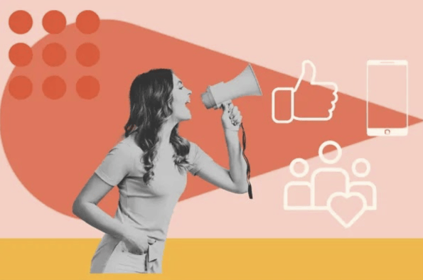 A content creator uses a megaphone to promote her content; How to Promote Your Content as a Creator