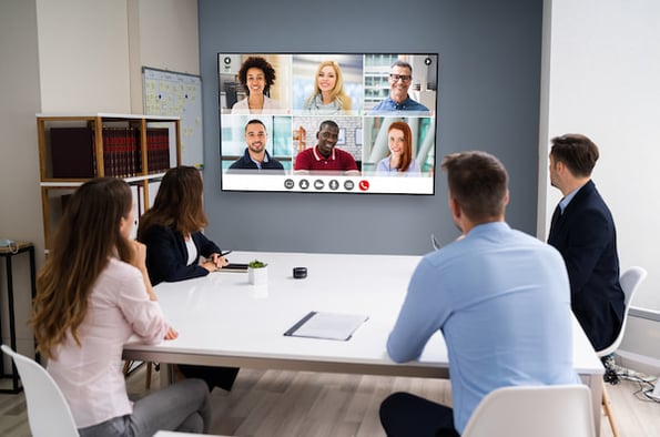 a hybrid customer service team having a virtual team meeting