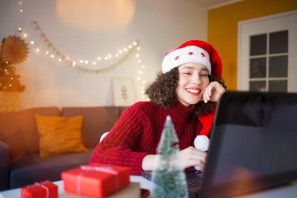 A marketer participates in a virtual holiday party.