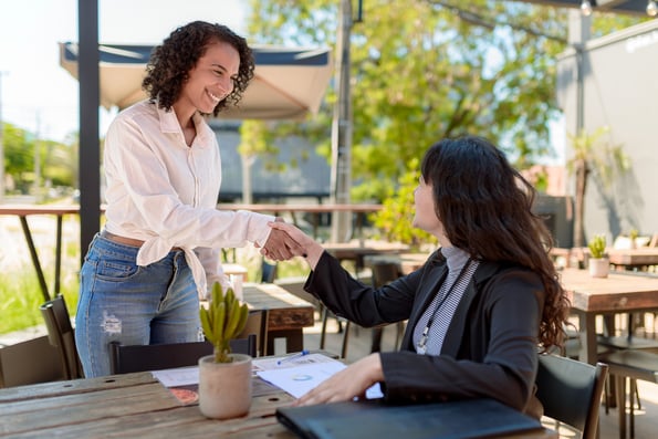 inbound recruitment at an event where recruiters shake hands