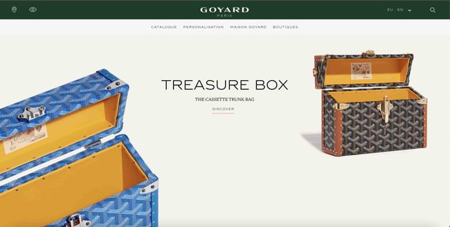 Luxury websites: Goyard. Website shows the company's signature Trunk bag. There are two trunk bags in the main frame. 