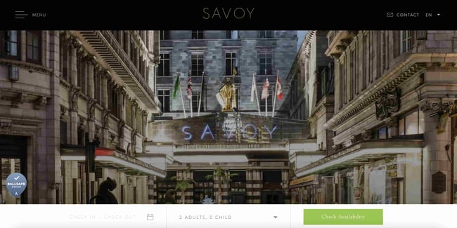 Luxury websites: The Savoy London. Website shows exterior image of the hotel, a grand building in London. 