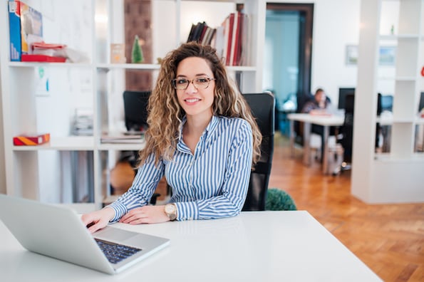 Salesperson researching open-ended sales questions for their next call