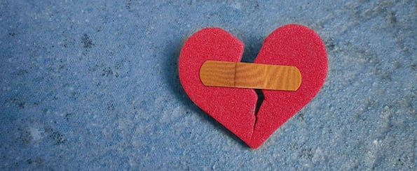 how to fix the agency-client relationship rut: image shows heart with band-aid on it