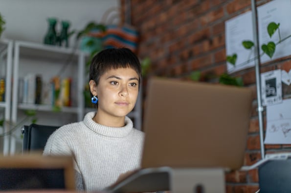 Person researching SaaS website design best practices