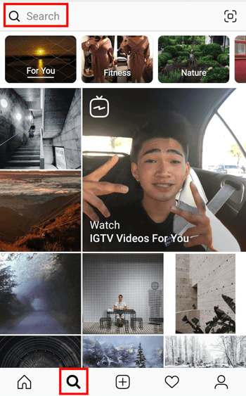 instagram home screen with magnifying glass icon and search bar highlighted in red - hashtagforlikes blog tech and instagram the best paid photo editing