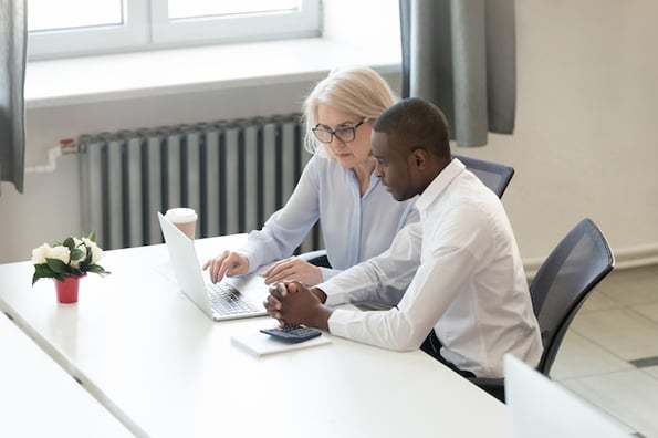 Two business leaders composing a crisis communication strategy