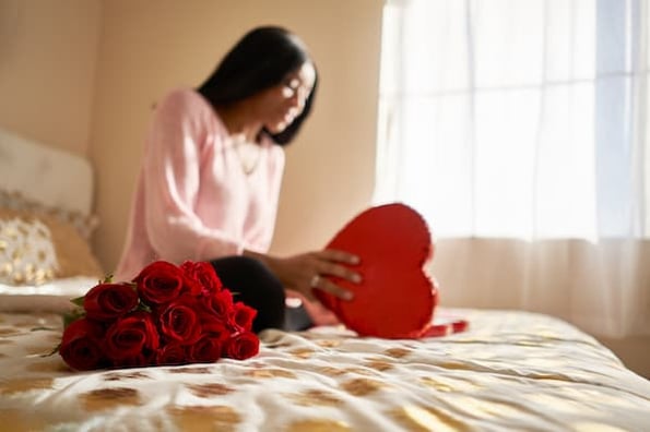 woman receives a gift advertised in a valentine's day campaign