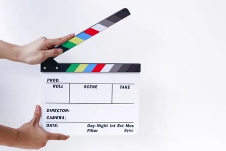 Using a video script template a marketing team starts shooting a video.