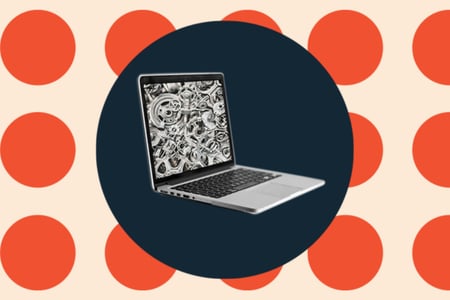 what wordpress theme is that: laptop over a background of orange dots 