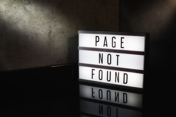 sign that reads page not found for a 404 error page