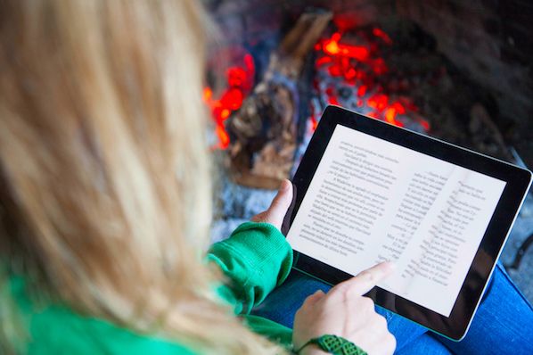 woman reading an ebook on an e-reader