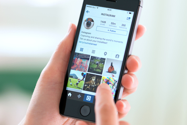 marketer getting ready to use instagram insights on mobile device
