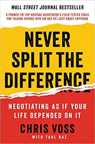 Front cover of Never Split the Difference, a must-read business book by Chris Voss and Tahl Raz.